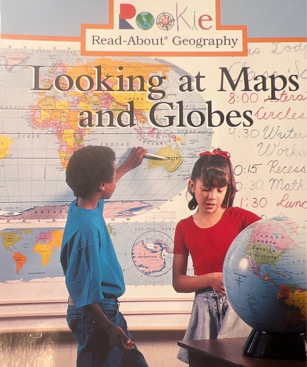 looking at maps and globes