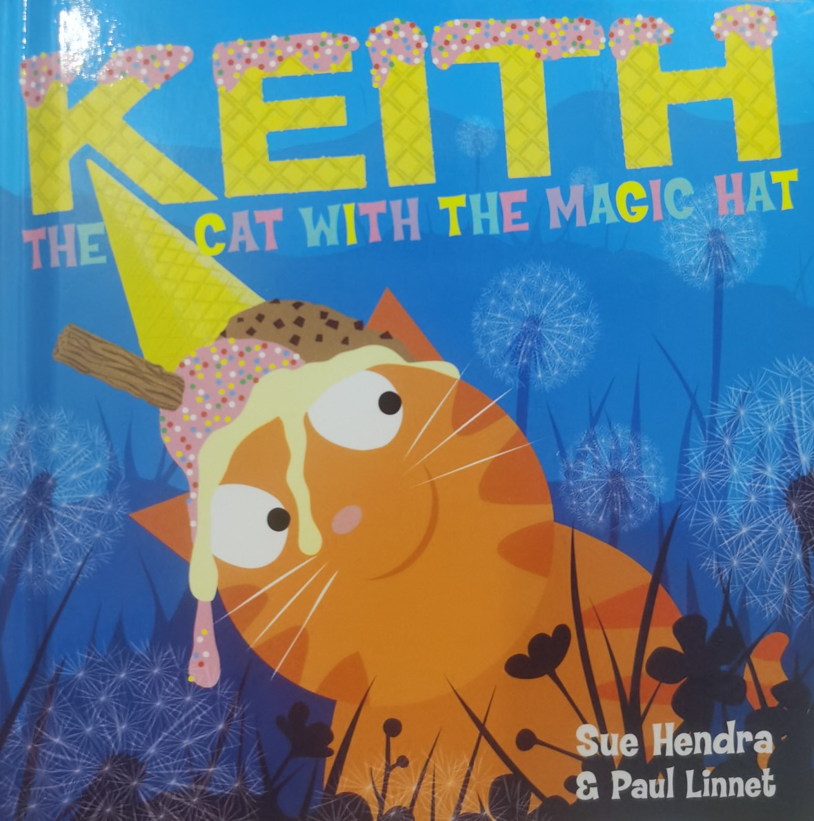 Keith the cat with the magic hat