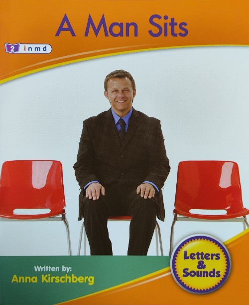 A Man Sits