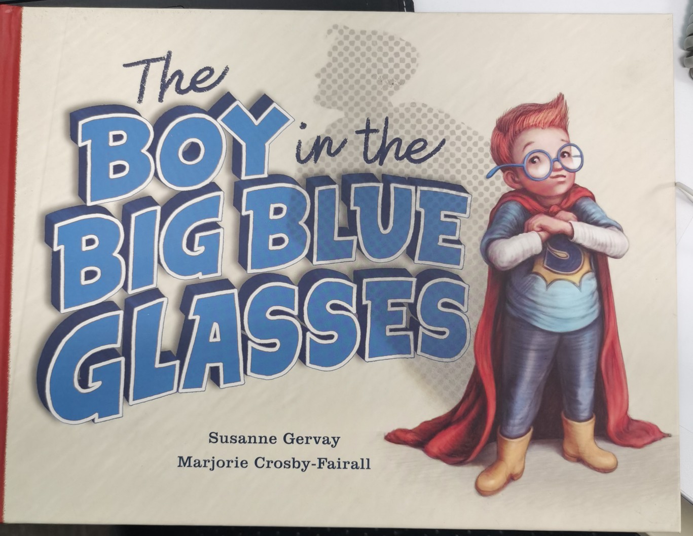 The BOY in the BIG BLUE GLASSES