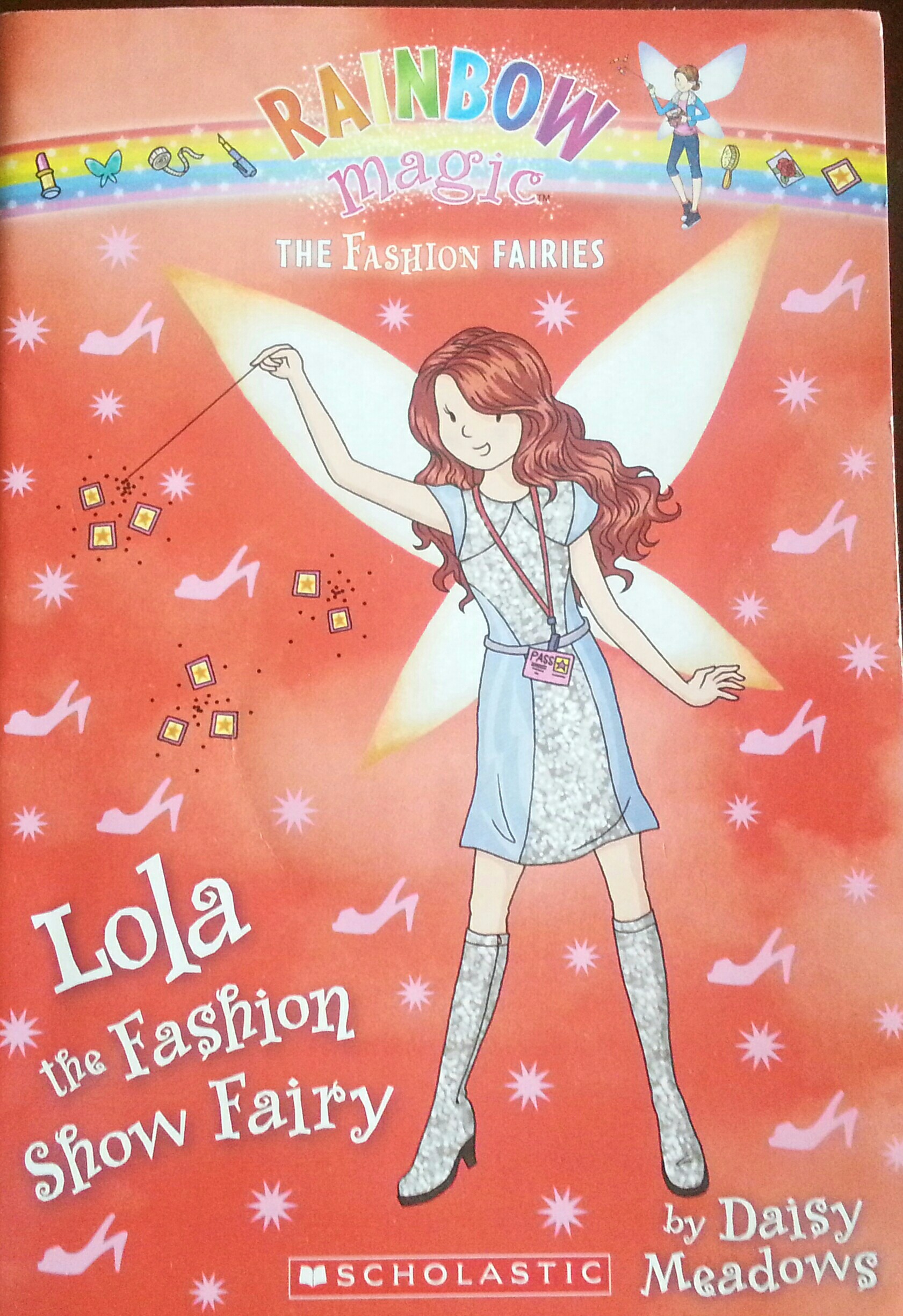 Rainbow magic the Fashion fairies 7 Lola the fashion show fairy