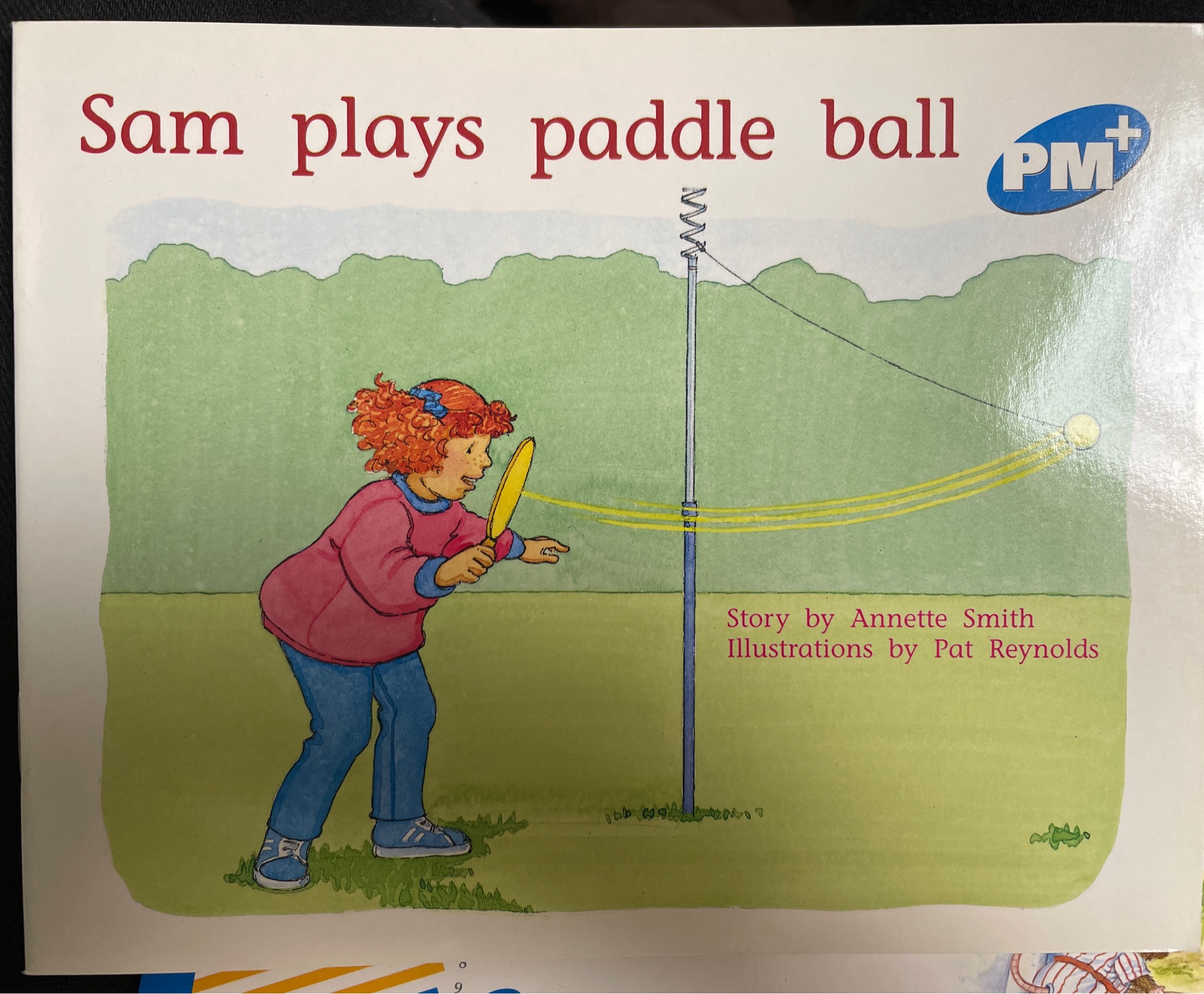 Sam plays paddle ball
