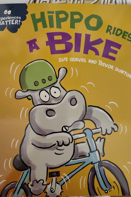 Hippo rides a bike