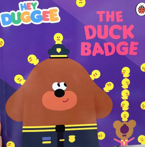 Hey Doggy:the duck badge