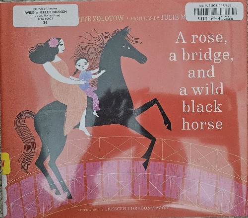 A rose, a bridge, and a wild black horse