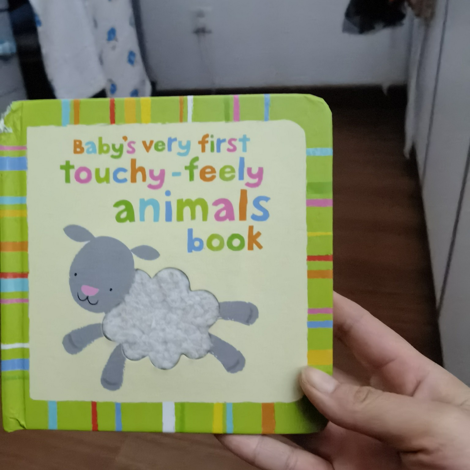 Baby's very first touchy-feely animals book