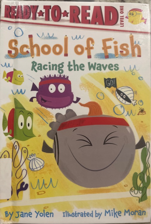 School of fish Racing the Waves