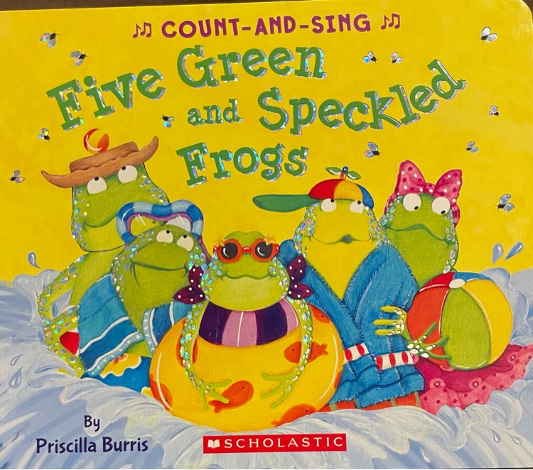 Five green and speckled frogs