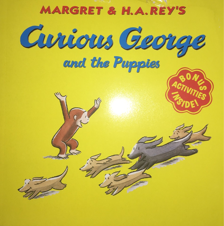 Curious George and the Puppies.