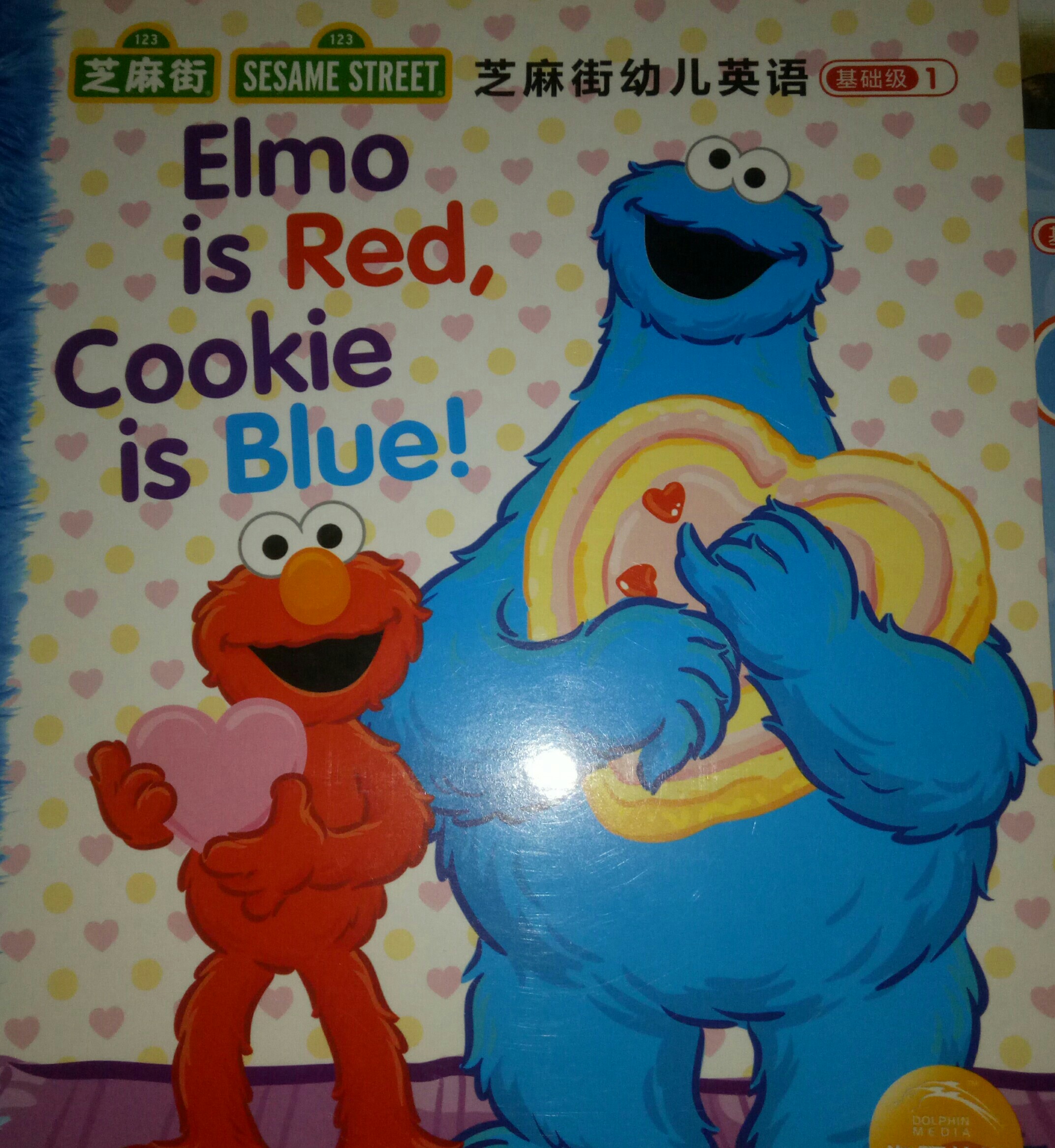 Elmo is red, Cookie is blue