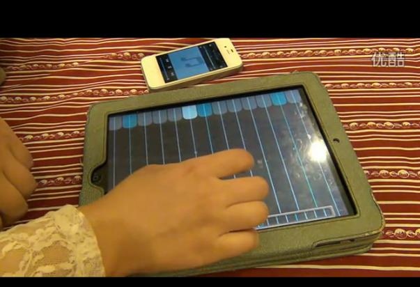 牛人用ipad弹古筝